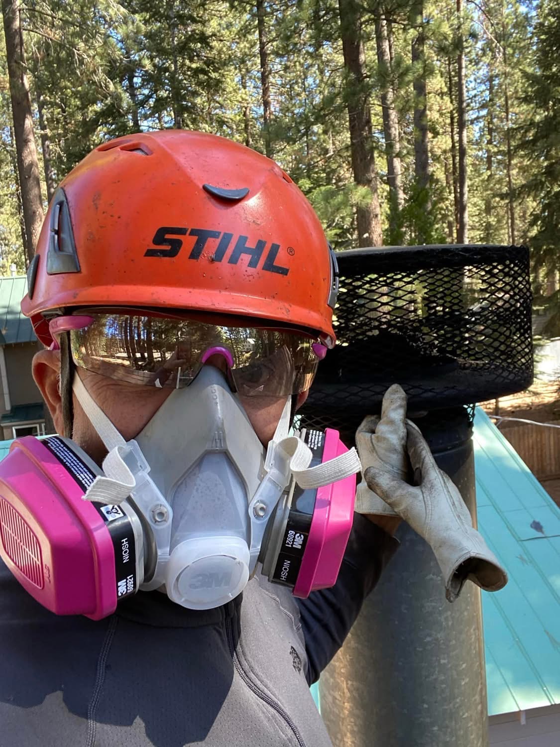Billy wearing protective equipment on the job.