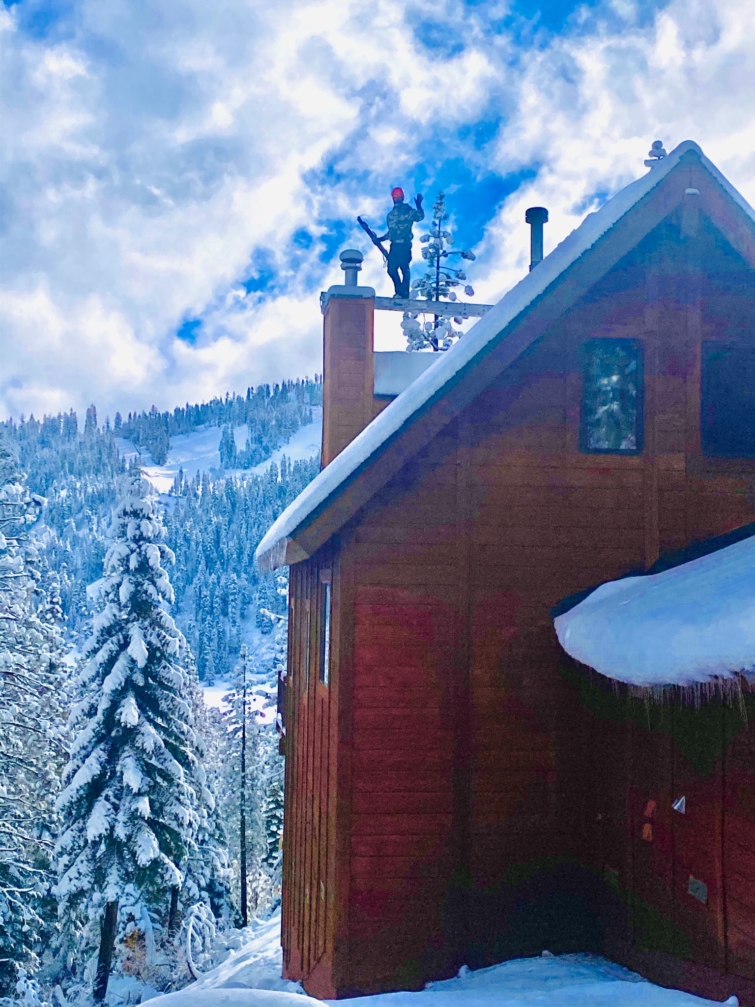 Chimney work at a snow-covered mountain home.
